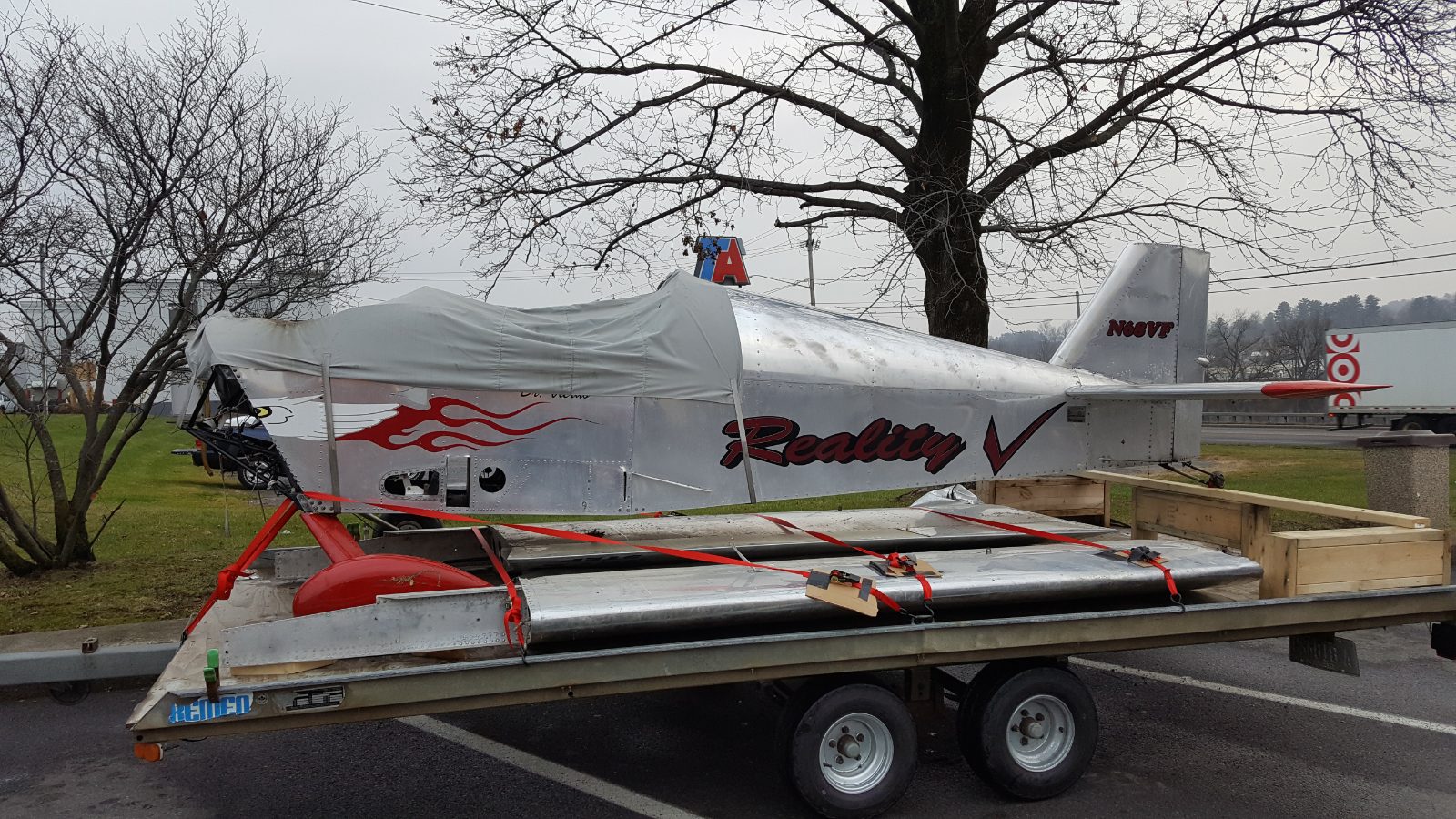 Experimental aircraft on a flatbed trailer