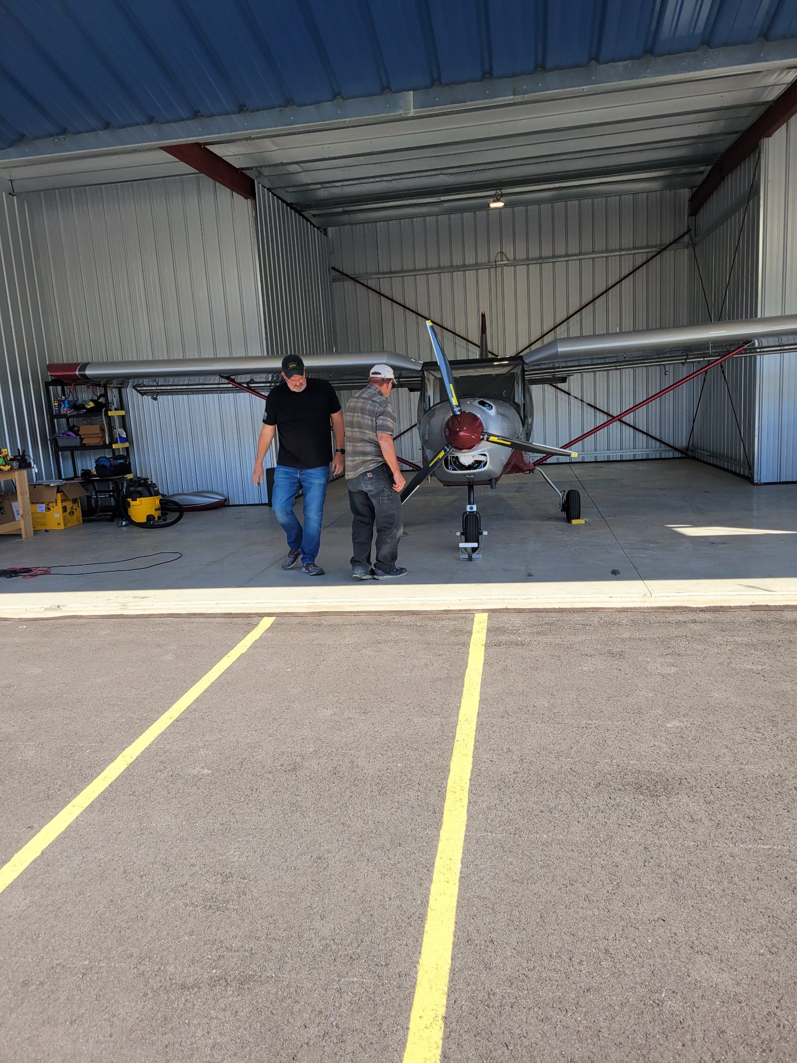 Aircraft and team in a hangar